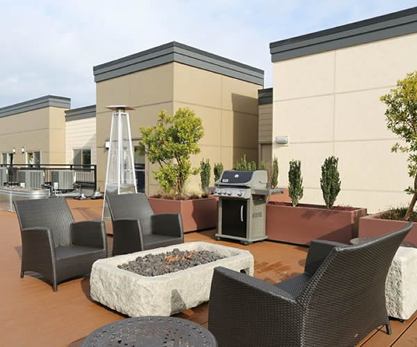 Photo of rooftop lounge on top of Savoy Lake City apartment building.
